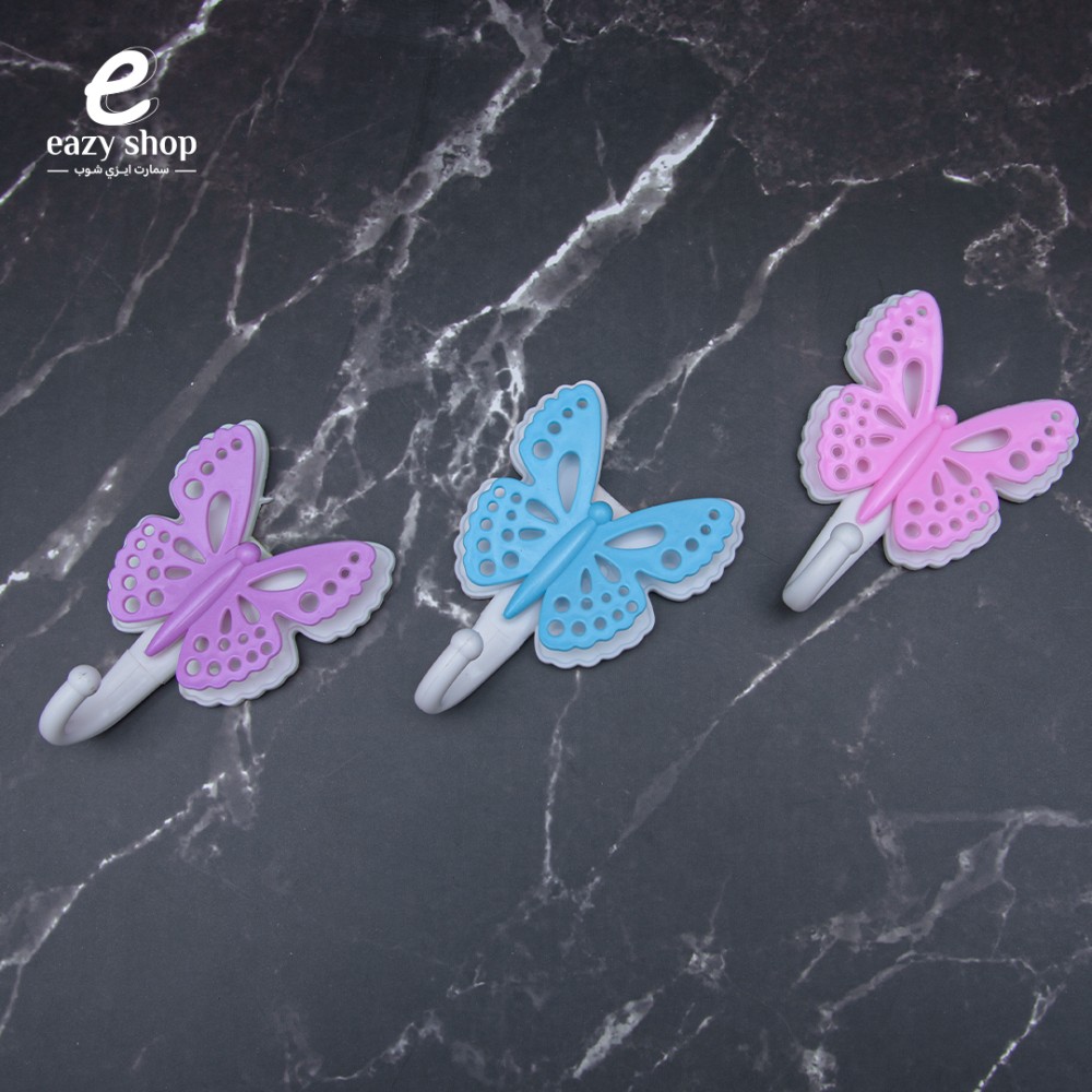 معاليق-ابو-فراشة-بلاستيك2 علاقي لاصق فراشة - الصورة 1